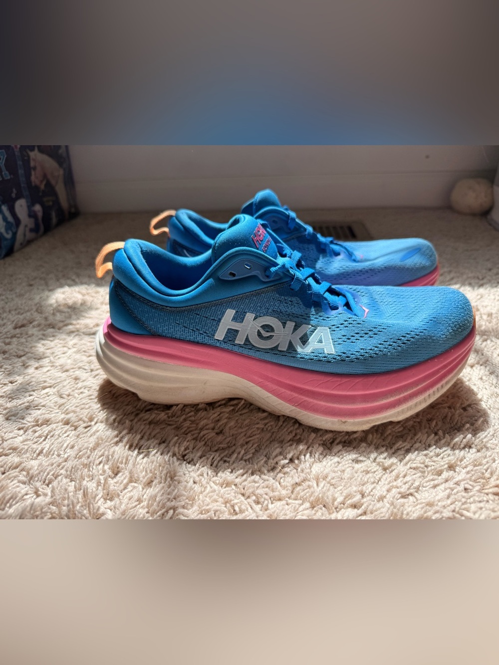 Hoka Women's Blue Running Shoes with Pink and White sole